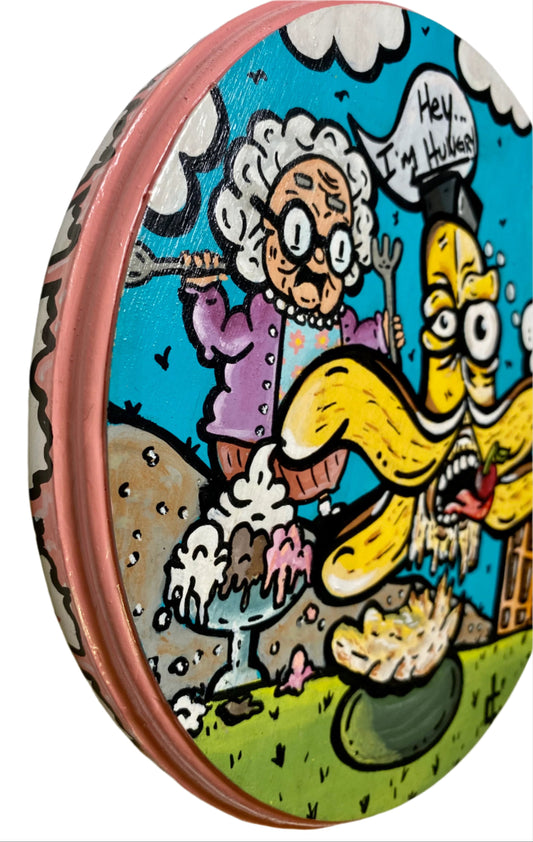 Colorful cartoon illustration painting on wood with acrylic of a graham chasing a banana and ice cream in the distance saying im hungry. Painting done Edmonton Artist Carly Marie 8.25" round on birch wood.