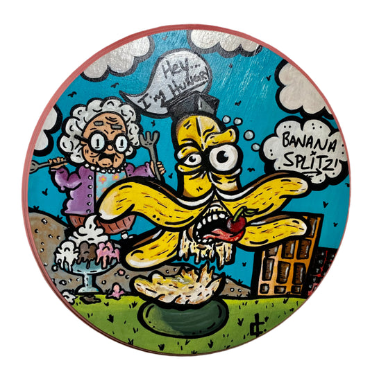 Colorful cartoon illustration painting on wood with acrylic of a graham chasing a banana and ice cream in the distance saying im hungry. Painting done Edmonton Artist Carly Marie 8.25" round on birch wood.
