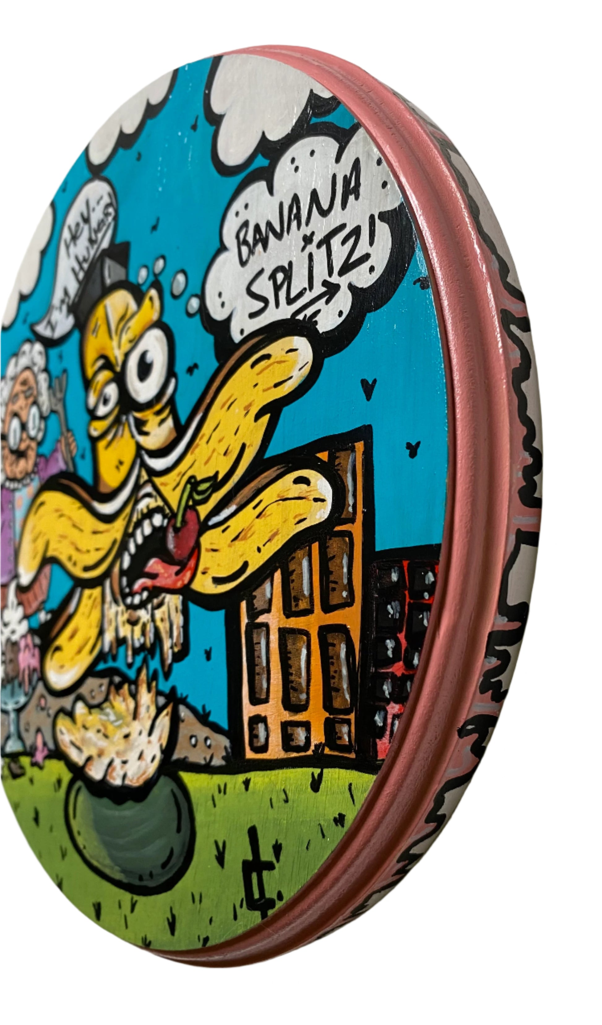 Colorful cartoon illustration painting on wood with acrylic of a graham chasing a banana and ice cream in the distance saying im hungry. Painting done Edmonton Artist Carly Marie 8.25" round on birch wood.